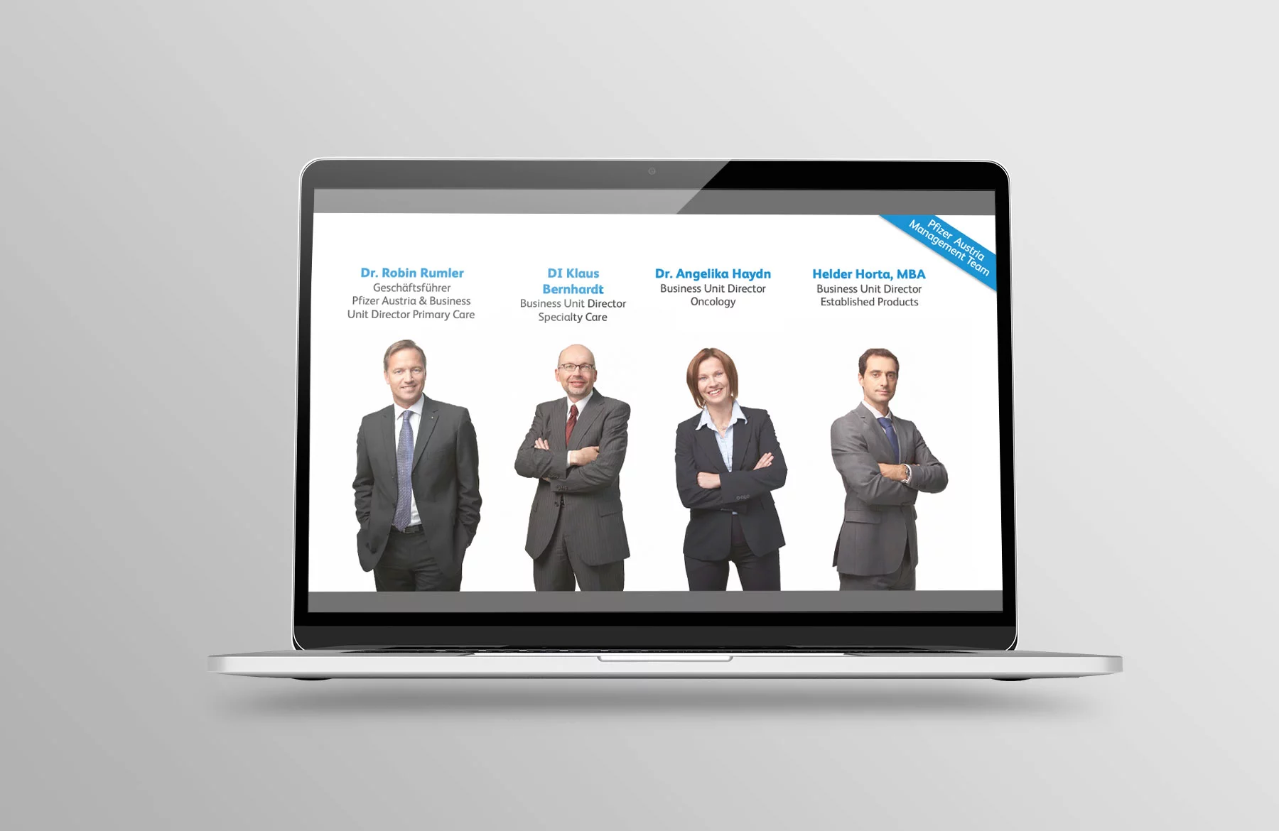 Montage Laptop Unternehmenspräsentation Pfizer Austria Folie Business Unit Directors